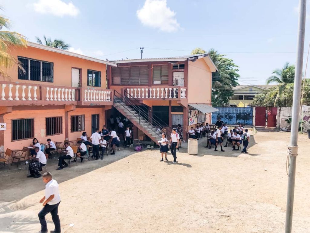 Outdoor classroom in Roatan. Students taking exams outside.